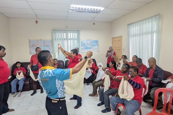 Basic Occupational First Aid Course hands-on CPR training AED demonstration during First Aid Course Malaysia Workplace safety first aid wound care session