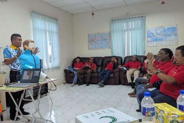 Basic Occupational First Aid Course hands-on CPR training AED demonstration during First Aid Course Malaysia Workplace safety first aid wound care session
