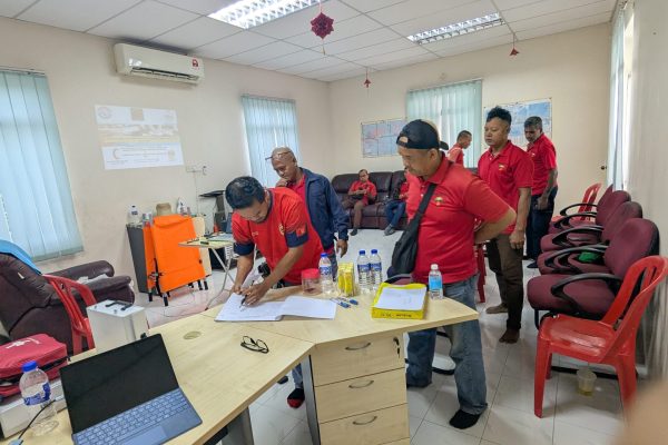 Basic Occupational First Aid Course hands-on CPR training AED demonstration during First Aid Course Malaysia Workplace safety first aid wound care session