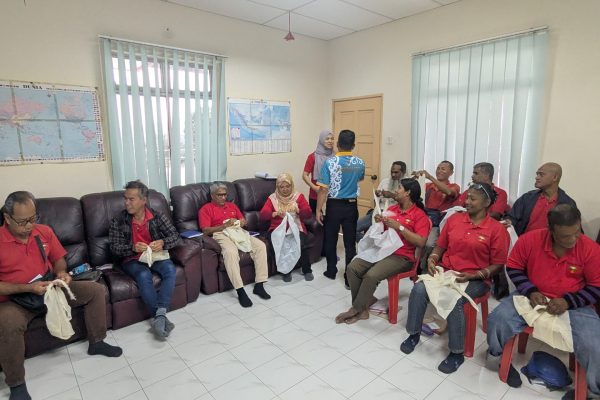 Basic Occupational First Aid Course hands-on CPR training AED demonstration during First Aid Course Malaysia Workplace safety first aid wound care session