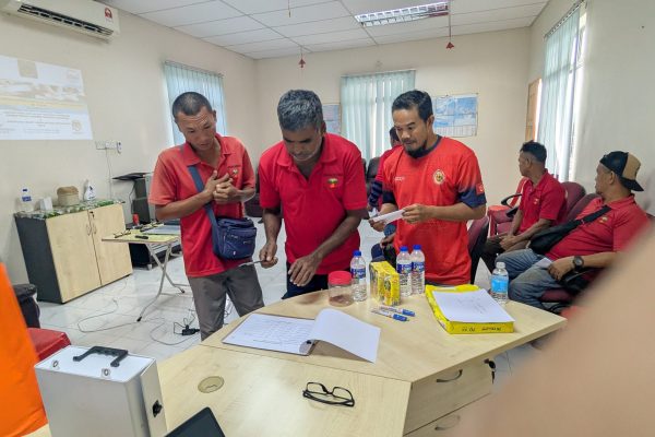 Basic Occupational First Aid Course hands-on CPR training AED demonstration during First Aid Course Malaysia Workplace safety first aid wound care session